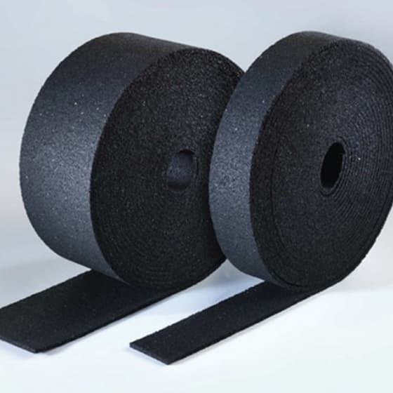 A sound isolating system used to prevent sound transfer through partitioning or party walls in all forms of construction where there is any point of contact.
Our acoustic isolation strip is a multi purpose sound isolating barrier system used to prevent sound transfer through stud partitioning or party walls in all forms of construction where there is any point of contact.
Manufactured from bonded, re-cycled rubber, acoustic isolation strip ensures acoustic integrity is maintained wherever there is any point of contact, for example where partition walls meet floors or ceilings or where stud battens are to be fixed to an existing wall to form and extra cavity and carry acoustic products.
It is 5mm thick and available in roll form in a variety of widths to suit the requirements of individual projects and constructions.
It is always used in conjunction with other soundproofing products and sound control measures to reduce noise transmission through wall, floors and ceilings.
For a general guide as to how this product is installed, please see the illustrations on the left.