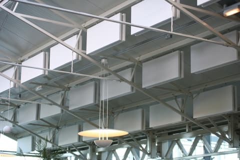 Decorative sound absorption panels which reduce reverberant and low frequency noise, hung in line or at different heights to create an unusual design feature.