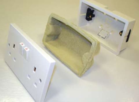 An acoustic insulation system for wall sockets to eliminate the transfer of sound through walls.